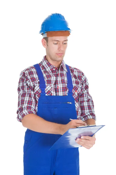 Happy Young Male Worker Holding Contract Form — Stock Photo, Image