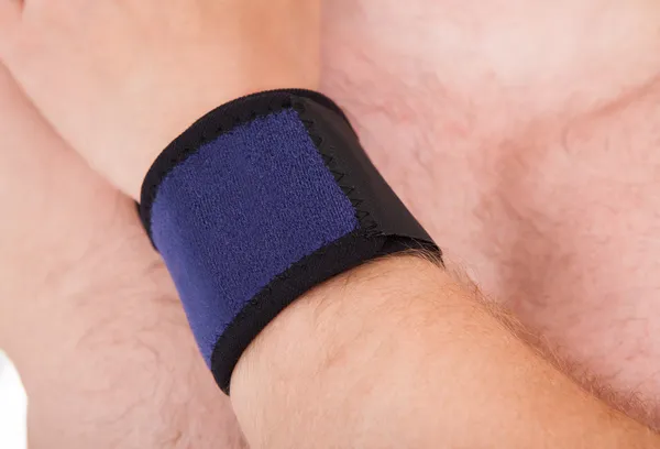 Close Up Of Man Wearing Wrist Brace — Stock Photo, Image