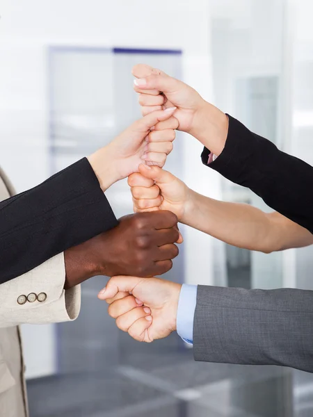 Businesspeople Stacking Fist Over Each Other — Stock Photo, Image