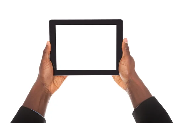 Homem de negócios segurando tablet digital — Fotografia de Stock