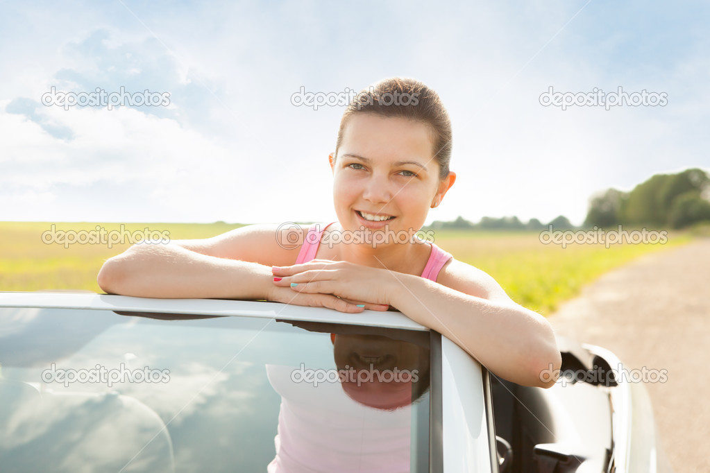 Happy Woman In Car