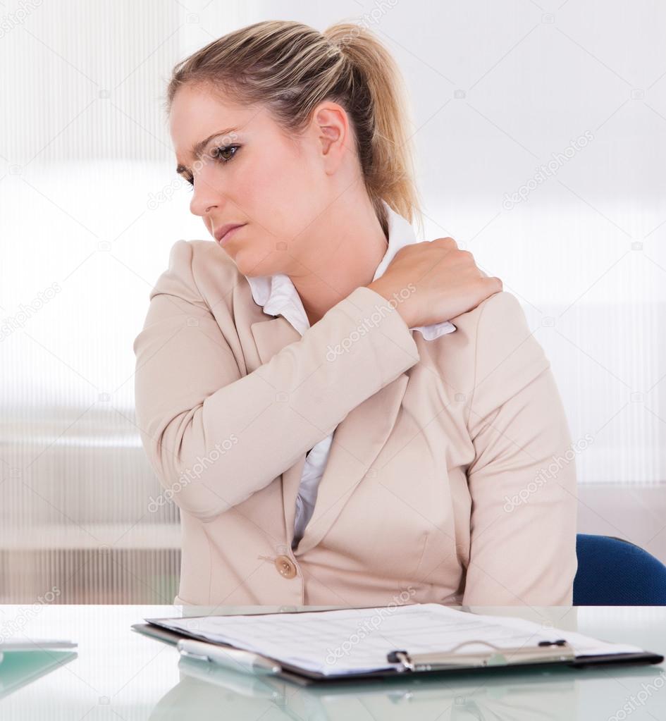 Young Businesswoman Suffering From Shoulder Pain