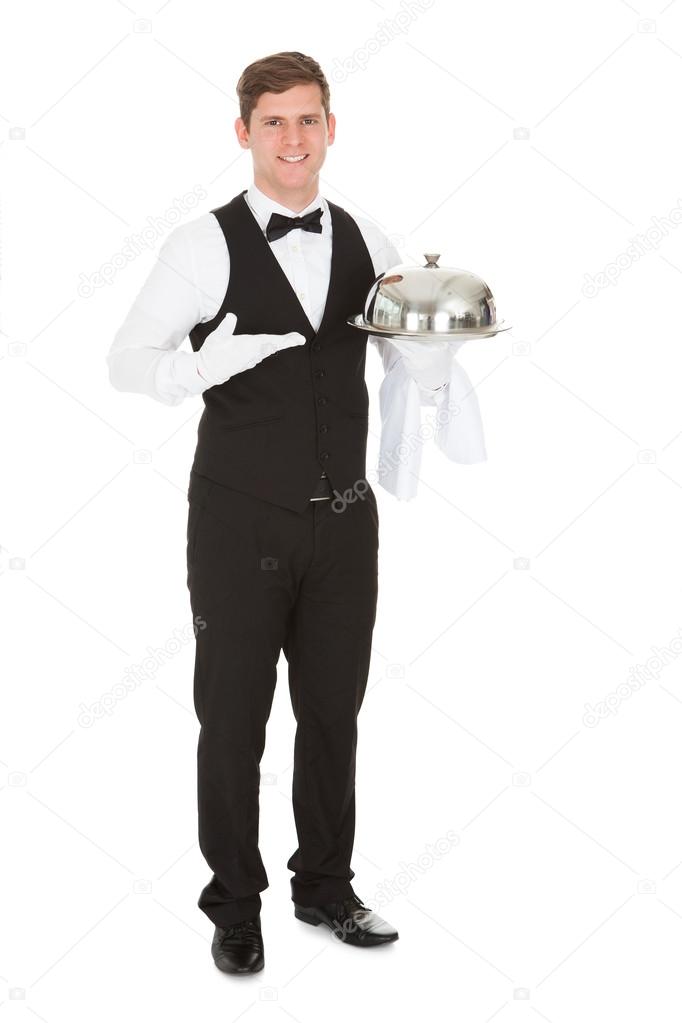 Waiter Holding Empty Silver Tray