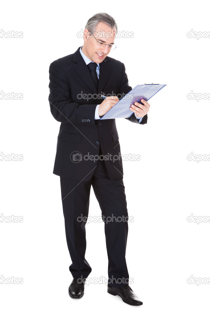 Mature Businessman With Clipboard
