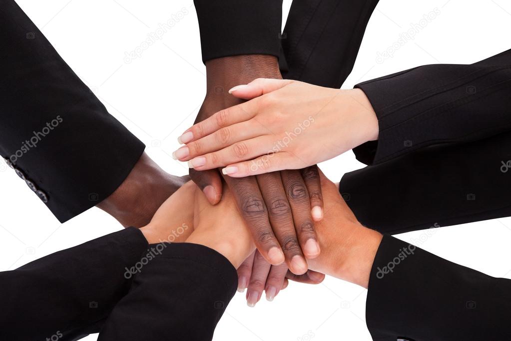 Businesspeople Stacking Hands