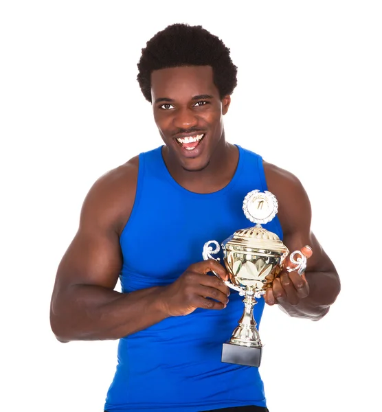 Happy African Athlete Holding Trophy — Stock Photo, Image