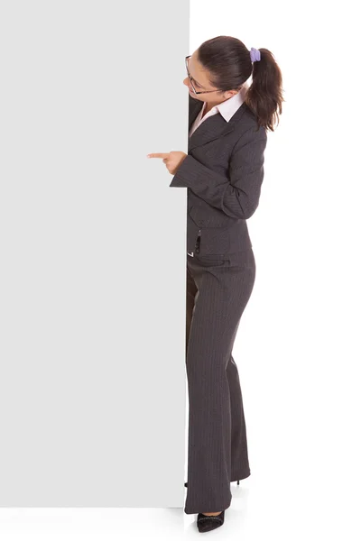 Businesswoman holding blank placard — Stok fotoğraf