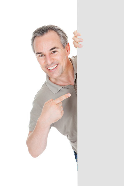 Happy Mature Man Standing and Placard
