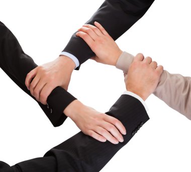 Birbirimizi holding iş adamları eller