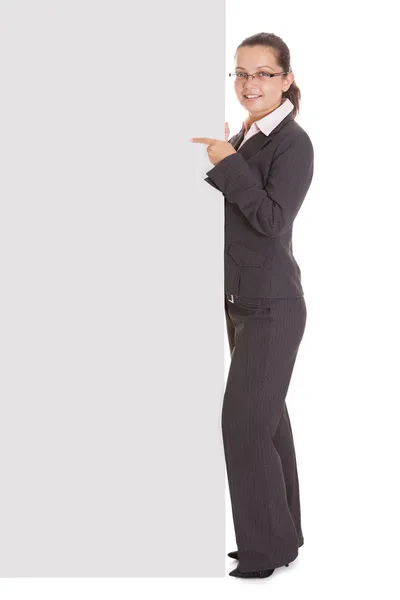Businesswoman holding blank placard — Stok fotoğraf