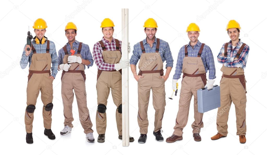 Group Of Workers With Equipment