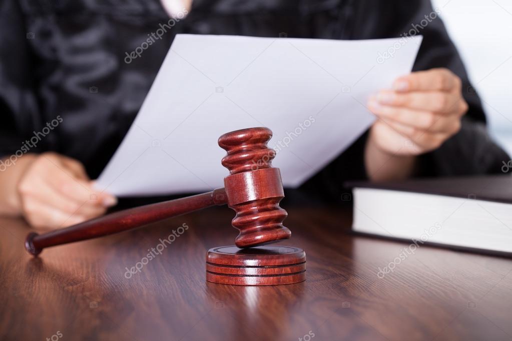 Female Judge Reading Verdict