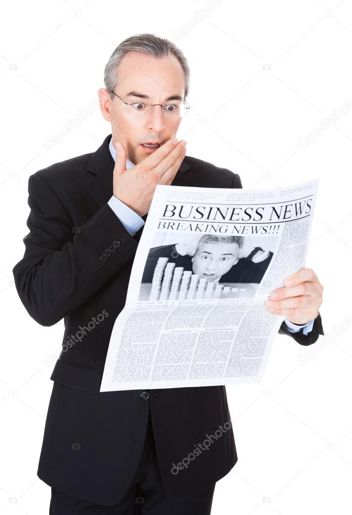 Businessman With Newspaper