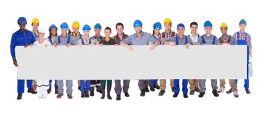 Group Of Construction Workers With Placard