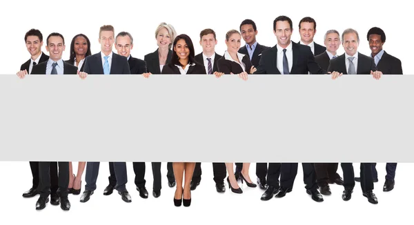 Group Of Businesspeople With Placard — Stock Photo, Image