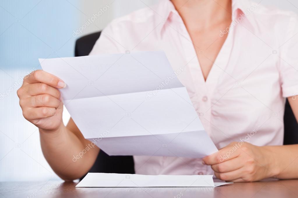 Businesswoman With White Envelope
