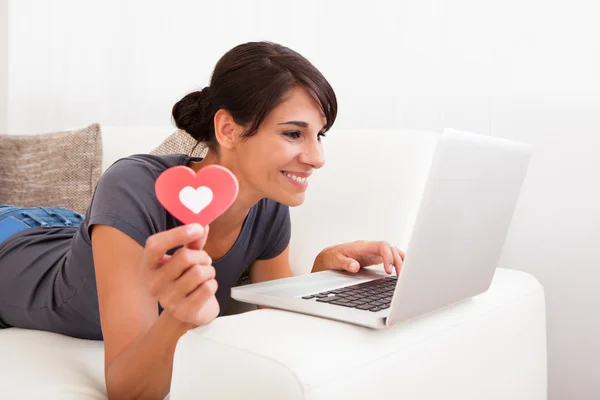Woman With Heart Shape And Laptop — Stock Photo, Image