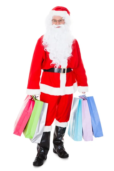 Portrait of santa holding shopping bag — Stock Photo, Image