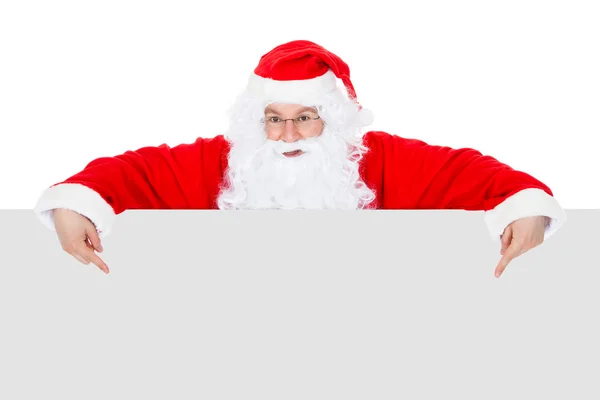 Portrait of a santa holding blank placard — Stock Photo, Image