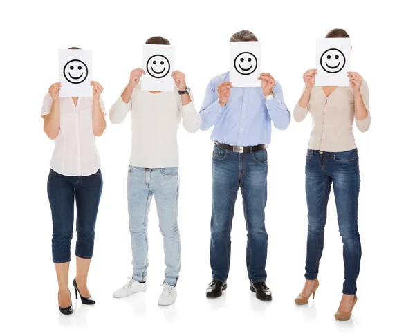 Group Of A People Holding Smiley — Stock Photo, Image