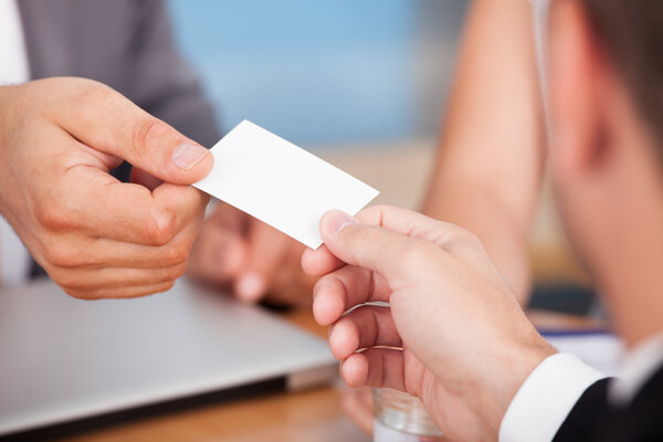 Businessman Giving Card
