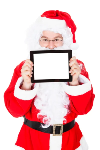 Portrait du Père Noël pointant vers la tablette numérique — Photo