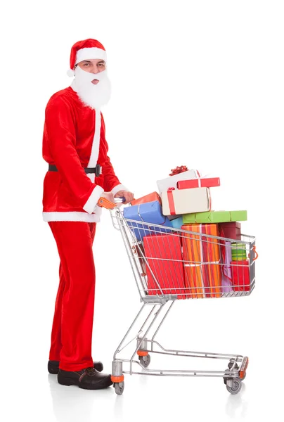 Santa holding alışveriş sepeti — Stok fotoğraf