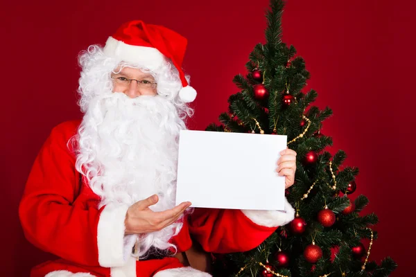 Babbo Natale con cartello bianco — Foto Stock