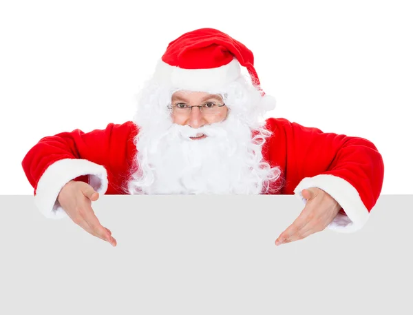 Retrato de un santa sosteniendo pancarta en blanco — Foto de Stock