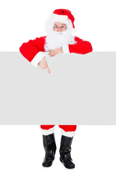 Retrato de un santa sosteniendo pancarta en blanco — Foto de Stock