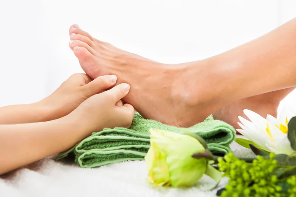 Woman Feet Undergoing Massage Royalty Free Stock Images