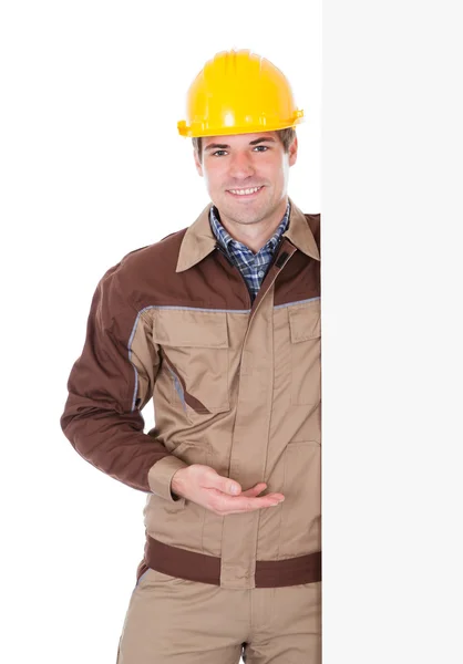 Male Worker Holding Blank Placard — Stock Photo, Image