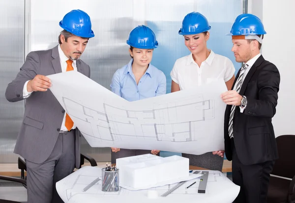 Architects Looking At Blueprint — Stock Photo, Image