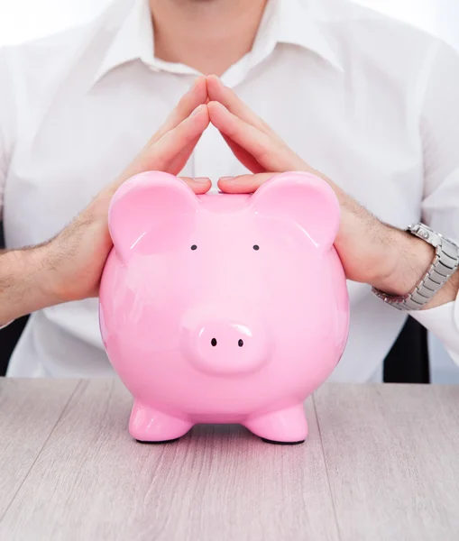 Businessman Holding Piggybank — Stock Photo, Image