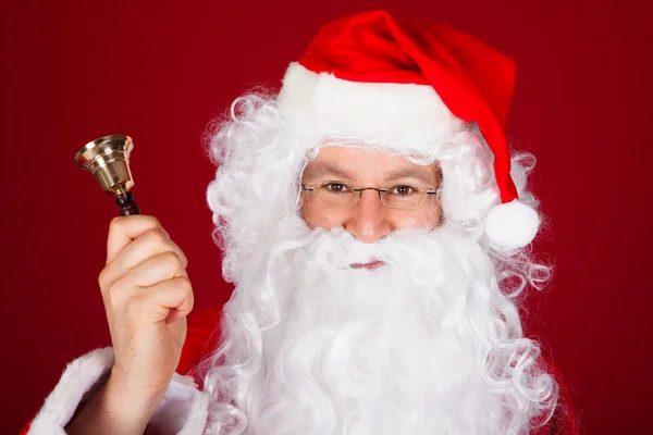 Santa holding bell — Stock Photo, Image