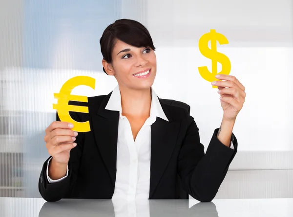 Businesswoman With Euro And Dollar Sign — Stock Photo, Image