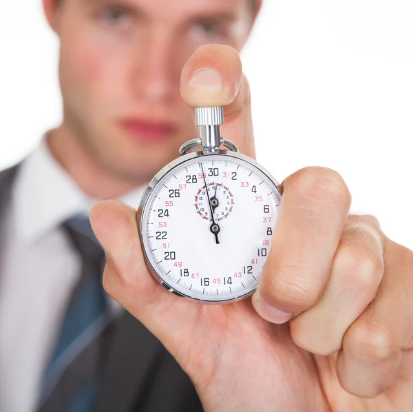 Zakenman bedrijf stopwatch — Stockfoto