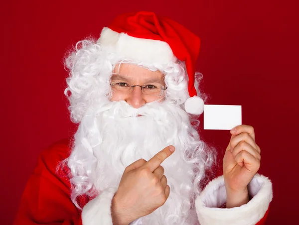 Retrato de un santa con tarjeta de visita en blanco —  Fotos de Stock