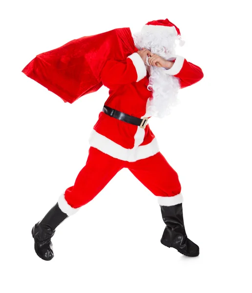 Ritratto di Babbo Natale che porta il sacco — Foto Stock
