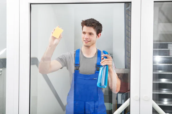 Cleaner Cleaning The Door Glass — Stock Photo, Image