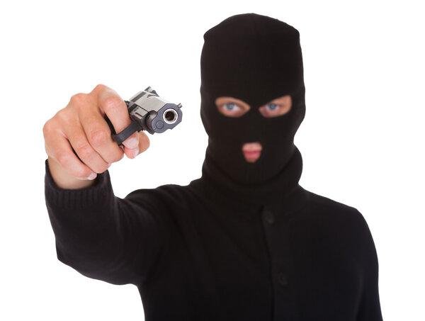 Burglar Holding Hand Gun