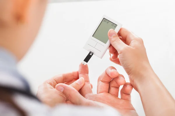 Managing Diabetes and Hypertension for Better Vision | Stock Photo