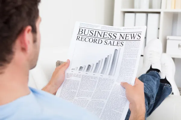 Young Man Reading Newspaper — Stock Photo, Image