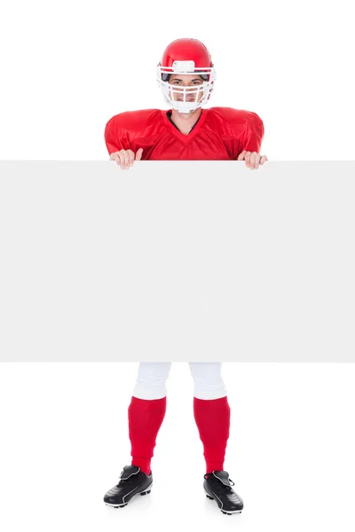 Jogador de rugby segurando Placard em branco — Fotografia de Stock