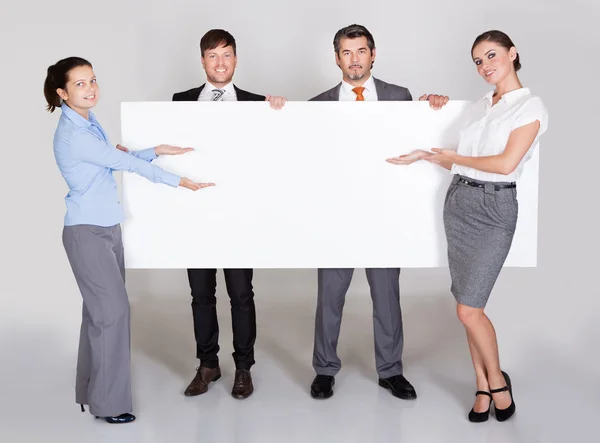 Empresários Holding Placard — Fotografia de Stock