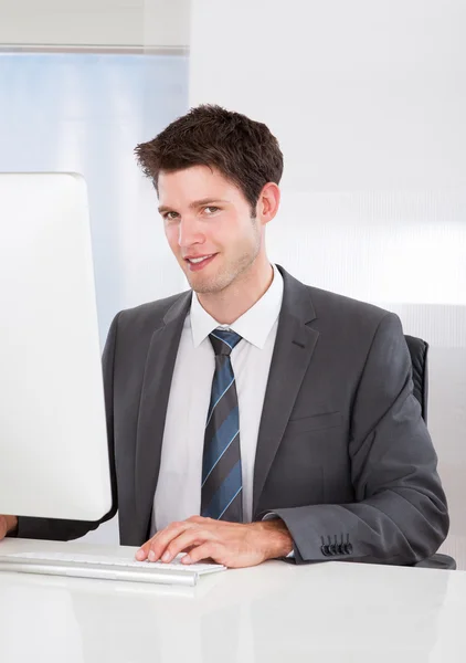 Businessman Working At Office Stock Photo