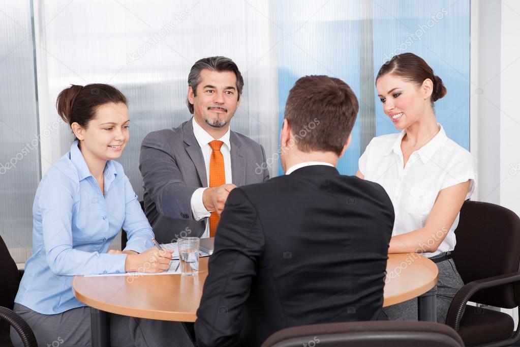Businesspeople Taking Interview
