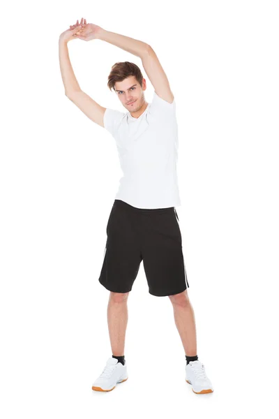 Young Man Stretching — Stock Photo, Image