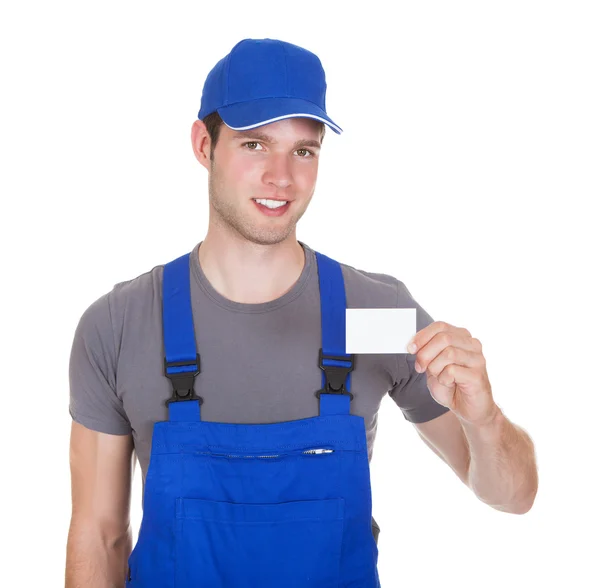 Mechanic Holding Visiting Card — Stock Photo, Image