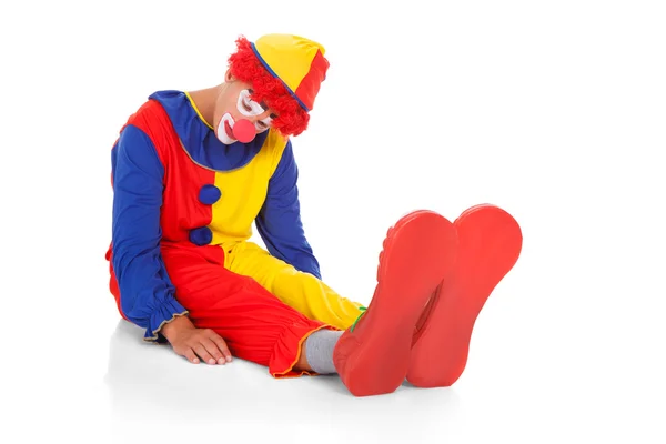 Utmattad clown liggande på framsidan — Stockfoto